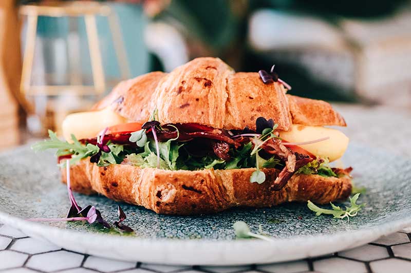 B.E.L.T – Smoked beef bacon, egg, lettuce and tomato in toasted croissant AED 57
بي.إي.ال.تي - لحم البقر المقدد المدخن والبيض والخس والطماطم في خبز الكرواسون المحمص 57 درهمًا